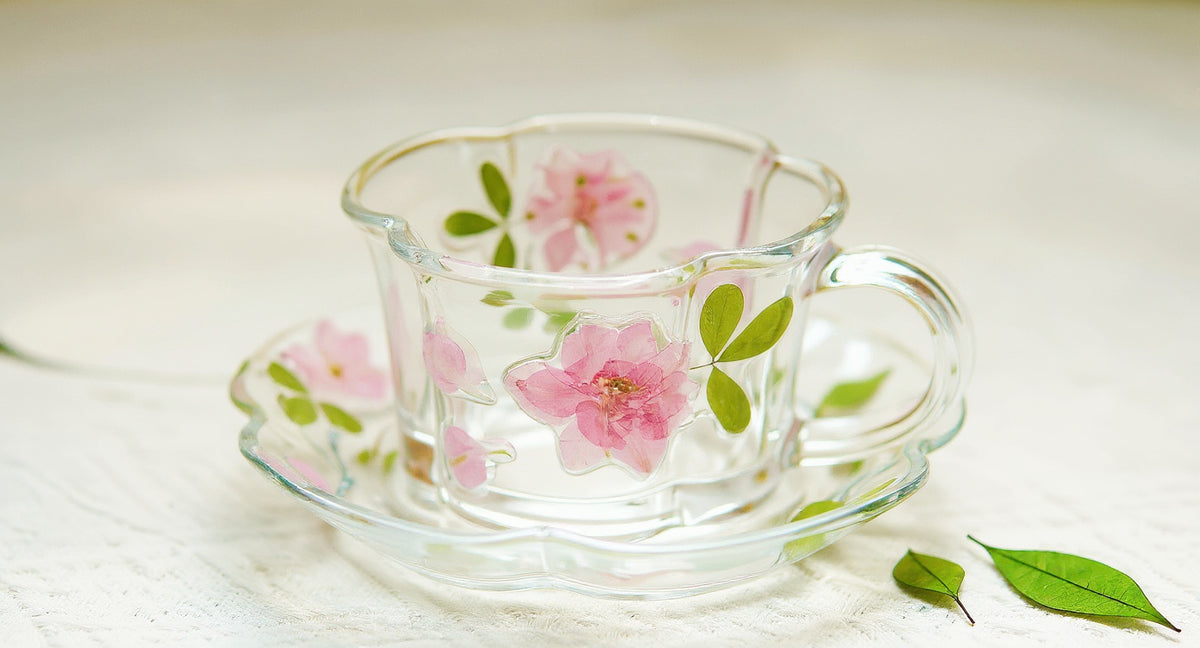 Handcrafted Pressed Flower Relief Glass Coffee Cup & Saucer with pink rose petals on marble