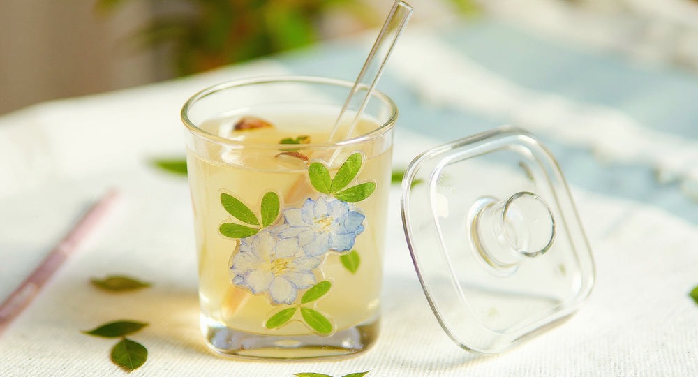 Handcrafted Preserved Flower Glass Cup 400ml with glass lid and straw on marble with lavender