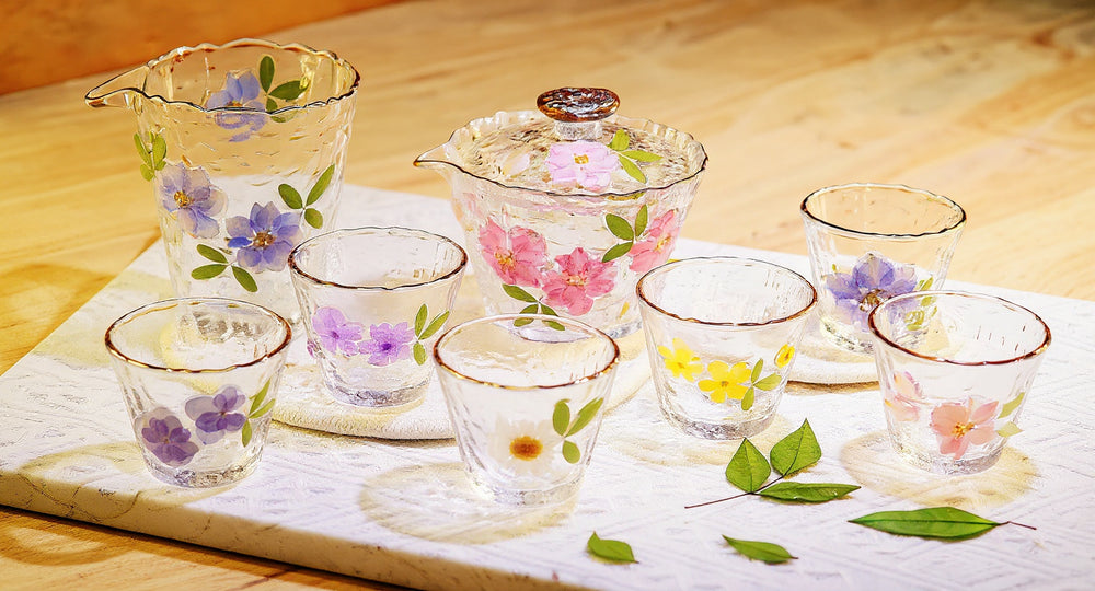 Pampasroom Handmade Hammered Glass Tea Set Real Pressed Flowers Gold Rim Gaiwan 8-Piece Gongfu Set on wood tray