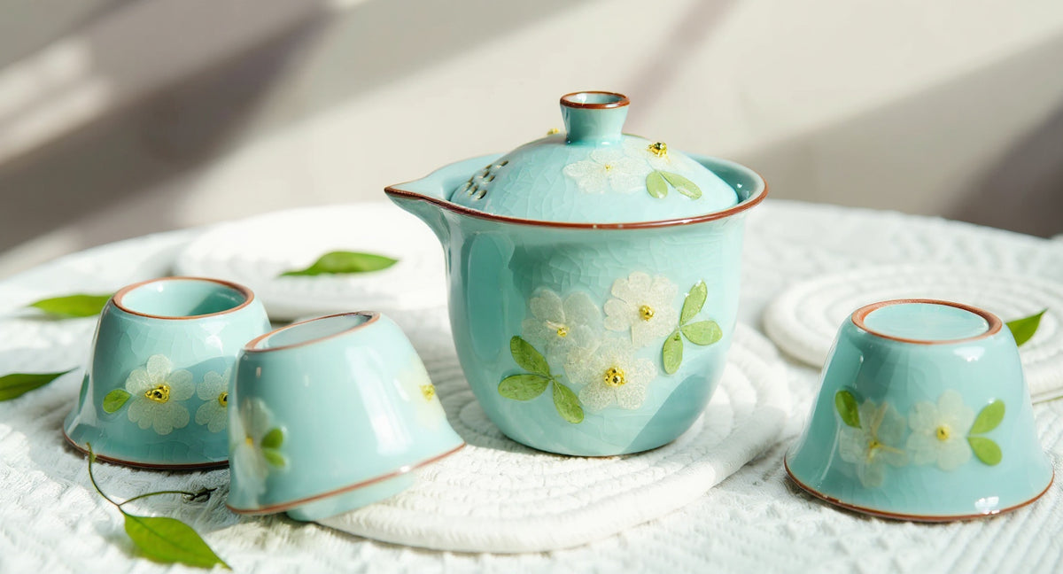 Handmade Ruyao Ice Crack Teapot Set with real pressed flowers on aged wood