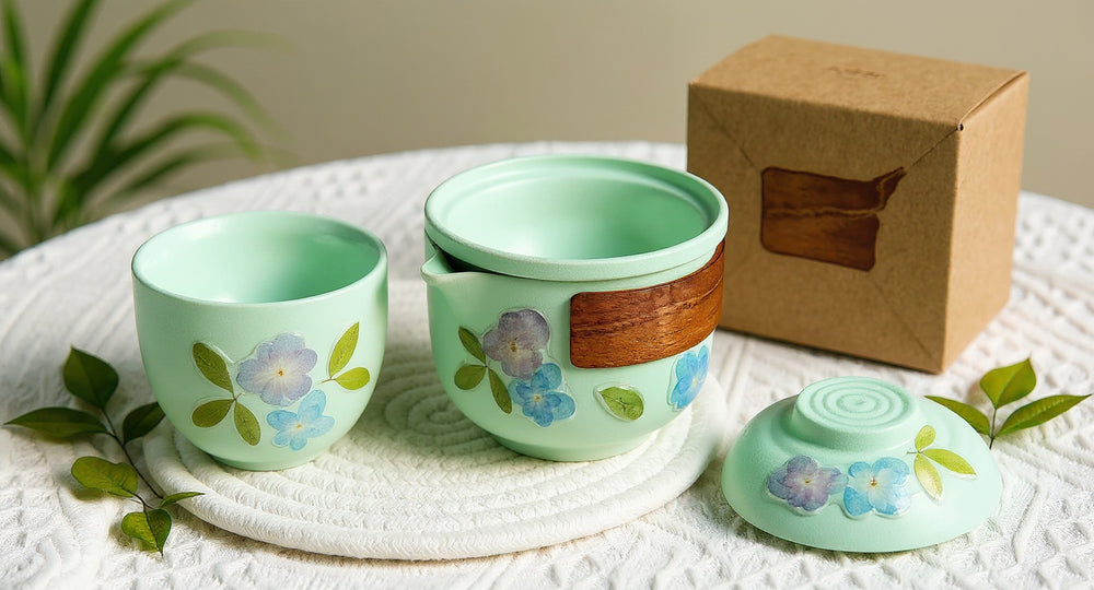 Handmade Travel Tea Set with real flower porcelain cup on linen runner