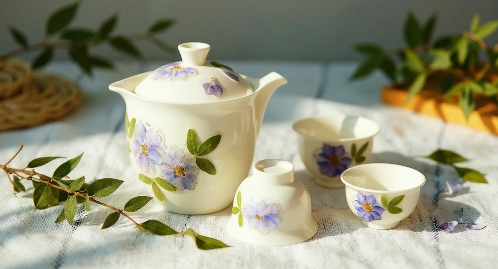 Handmade Suet Jade Porcelain Teapot Set with embedded pressed flowers on linen