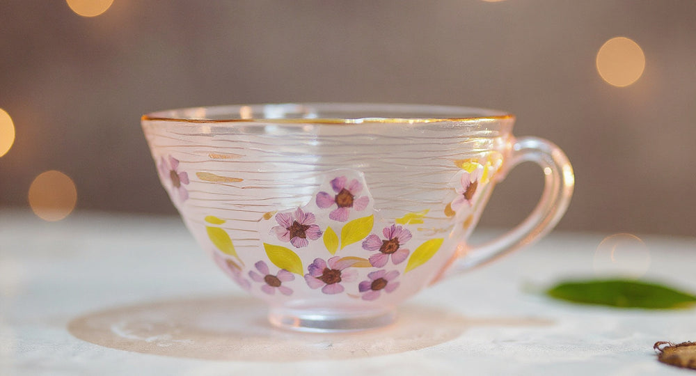 Handmade Gradient Pink Butterfly Glass Mug with real preserved flowers and gold edge on marble tray