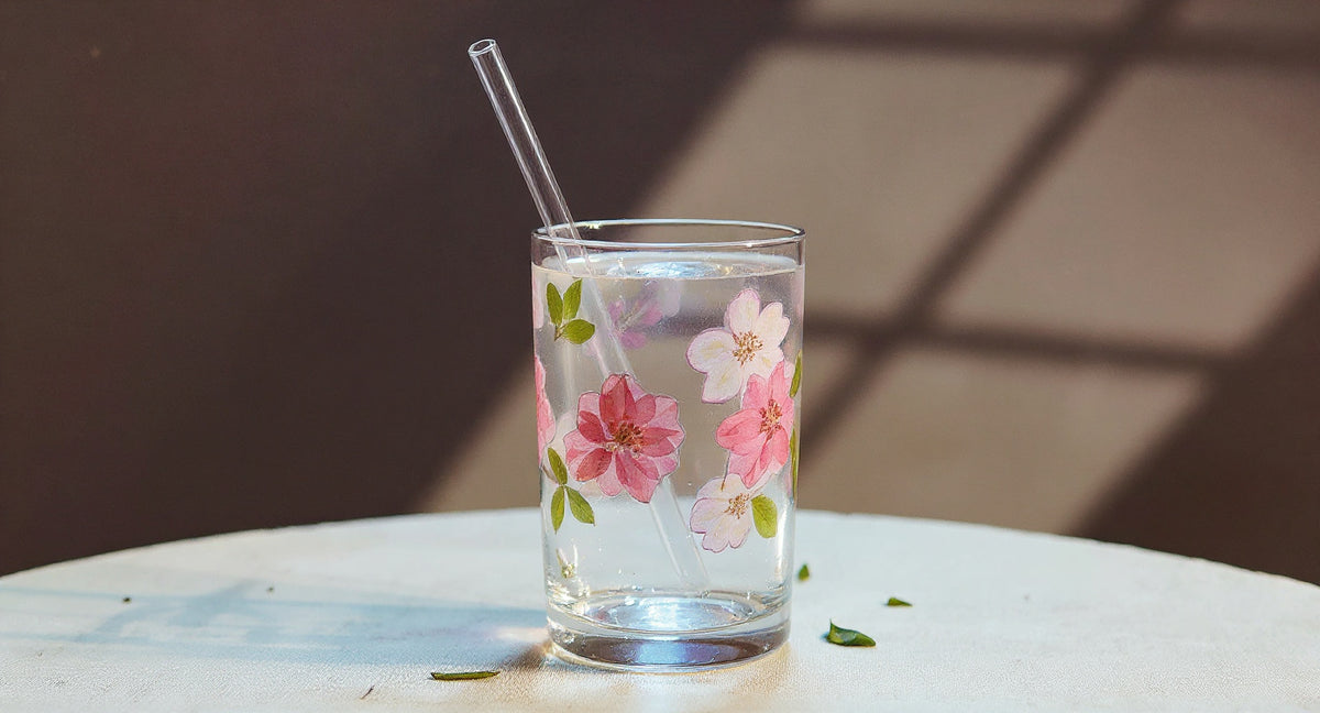 Handcrafted Pressed Flower Glass Tumbler 400ml with straw on linen and brass tray